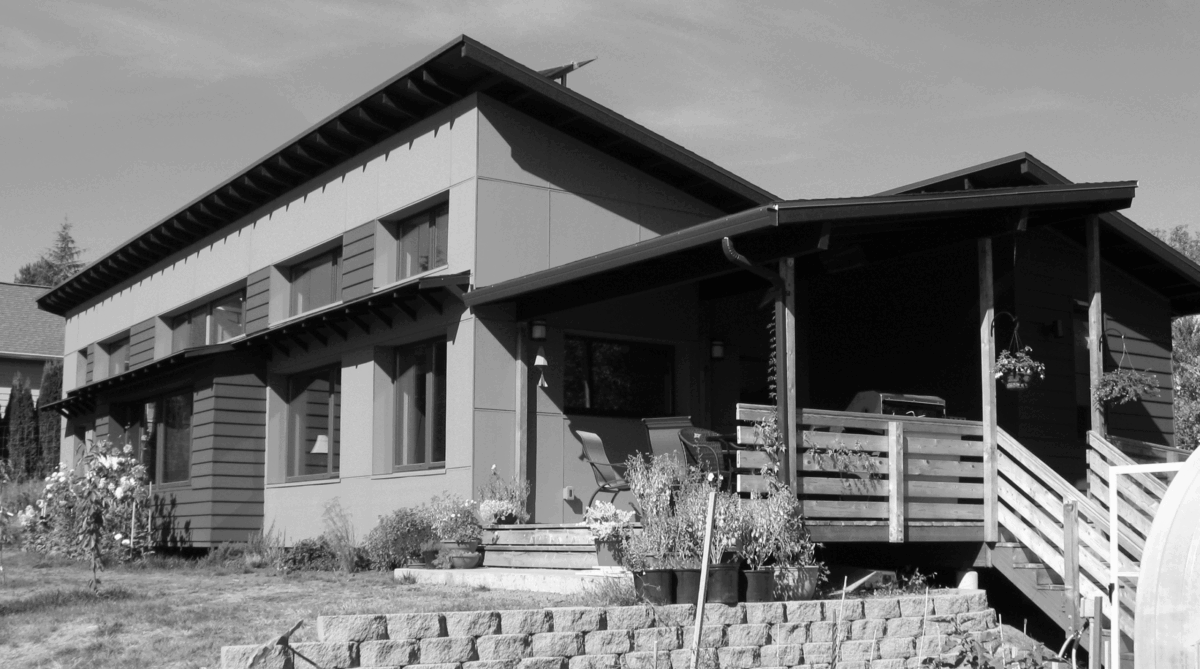 Black and white photo of exterior of Passive House designed by Cultivate and built in Dundee, Oregon.